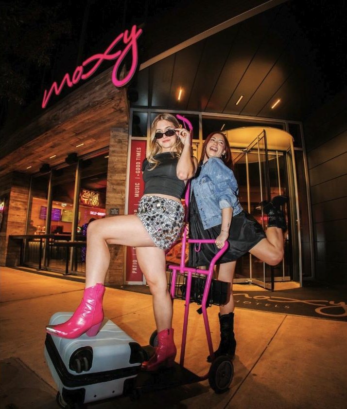 Pink boots outside Moxy Austin