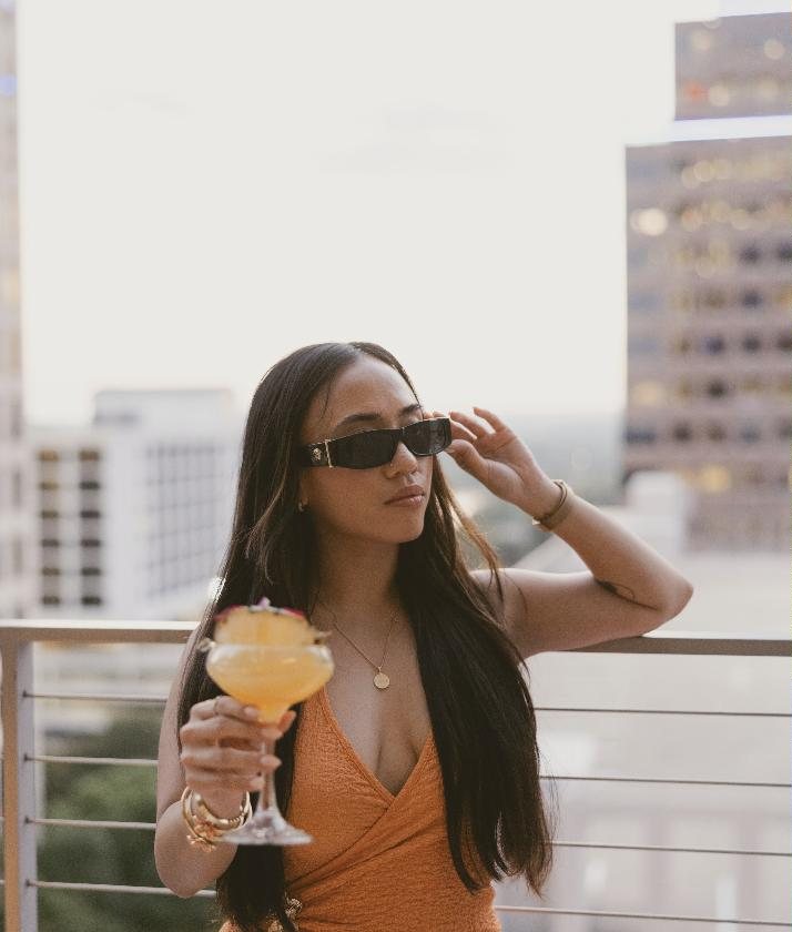 Cocktail on a rooftop at sunset